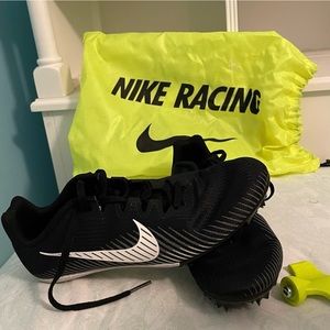 Women’s Nike 7.5 Running spikes for track comes w bag and spike changing tool